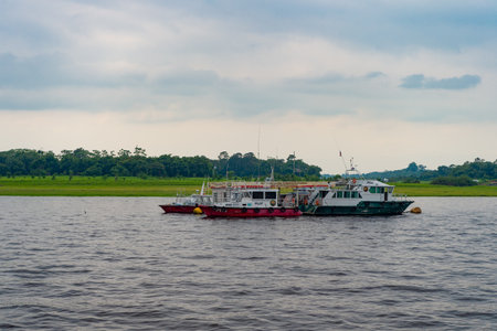 Manaus, Brazil - December 04, 2015: dock harbour with boat to travelのeditorial素材