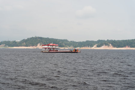Manaus, Brazil - December 04, 2015: cargo ferry barge carrying carsのeditorial素材