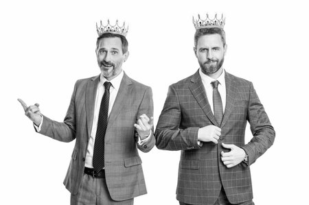 successful businessmen smile in crown isolated on white background. successful businessmen in crown...
