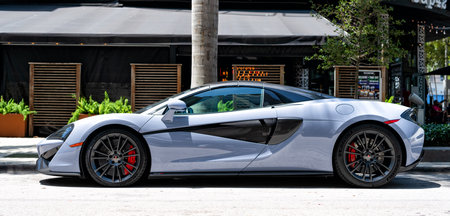 Miami Beach, Florida USA - April 15, 2021: white mclaren 570s parked sportcar, side viewのeditorial素材