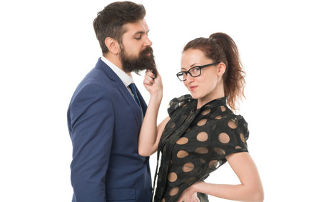Follow the leader. Sexy woman touch man beard. Business woman rule businessman. Couple in love. Having affair. Love affair in office. Conducting affair at work. Workplace affair. Love and romanceの写真素材
