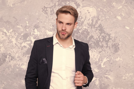 handsome businessman on background. photo of businessman wear suit.の写真素材