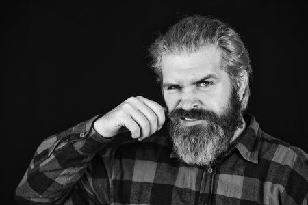 perfect moustache. Male barber care. Bearded man. Hair and beard care. Confident handsome brutal...