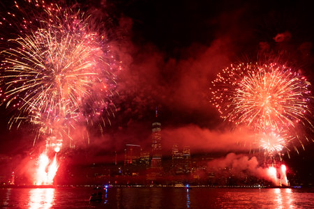 New years eve New York Manhattan fireworks. New York Fireworks over Manhattan. New York City 4th of July Fireworks. New York City Skyline Manhattan with Flashing Fireworks. Independence day.の写真素材