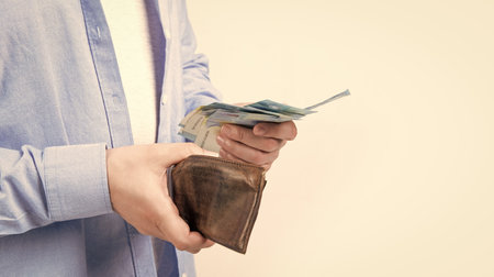 selective focus photo of man with cash money. man with cash money isolated on studio