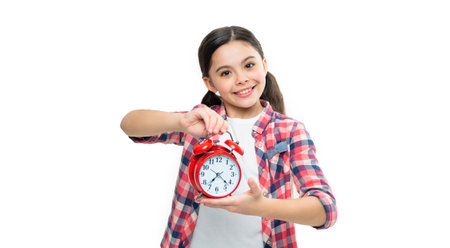 teen girl holding alarm time on background. photo of teen girl with alarm time clock.