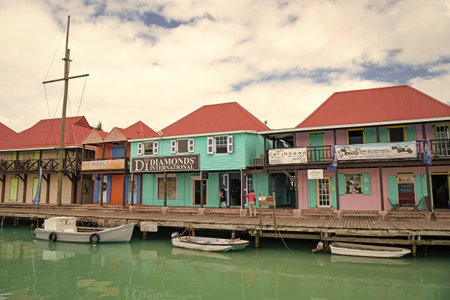 St. Johns, Antigua and Barbuda - January 15, 2016: building houses in cruise port with docked boats