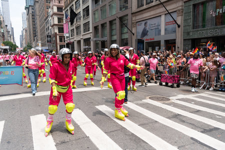 NEW YORK, NY, US - June 25, 2023: Pride march parade 2023 in New York. barbie pink lesbian girls...