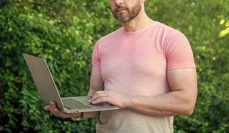 cropped view of freelancer man outdoor. freelancer man work online. photo of freelancer man...