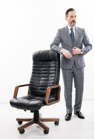 successful businessman man in boss office shows business success and leadership.の写真素材