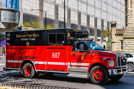 Chicago, USA - April 27, 2023: Fire Department truck on the road passenger side view