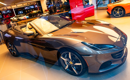 New York City, USA - August 09, 2023: Ferrari Portofino M 2023 convertible sport car in showroom, side viewのeditorial素材