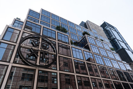 New York City, USA - August 05, 2023: facade of the building, at 61 Ninth Avenue in Chelsea, marketing and search company, Logoのeditorial素材