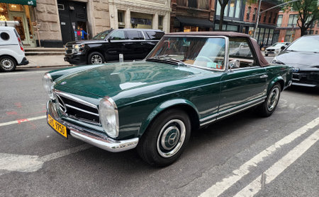 New York City, USA - June 03, 2023: Mercedes-Benz W113 two-door green metal front side view in the...