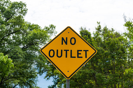 road sign of no outlet. caution yellow roadsign. traffic sign on the road. attention caution road sign. no outletの写真素材