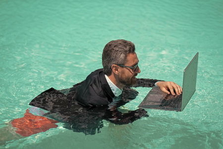 happy man has business video call in weekend with laptop. photo of man has business video callの写真素材