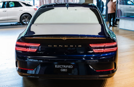 New York City, USA - August 06, 2023: Genesis G80 Hyundai electric black car rear view parked at...