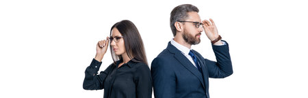 Business man and woman in glasses. Businesspeople look through eyeglasses. Business vision and eyesight. Vision of success. Successful and confident businesspeople in suit. Inspiring business visionの写真素材