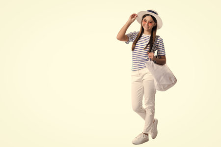 photo of teen girl in summer style, copy space advertisement. teen girl in summer styleの写真素材