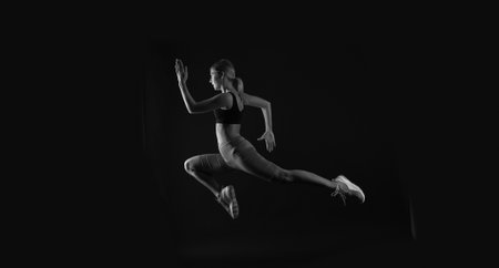 woman sport runner on background, stamina. photo of woman sport runner wearing sportswear.