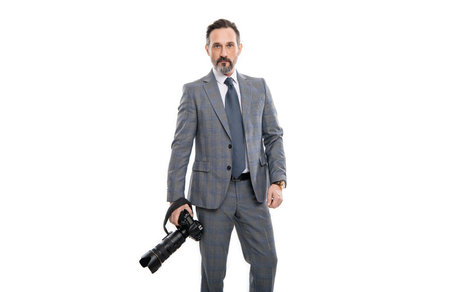photojournalist man paparazzi photographer taking photo with camera isolated on white