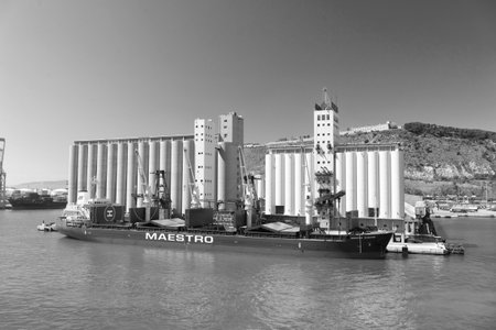 Barcelona, Spain - March 30, 2016: maestro diamond cargo barge transport at the harborのeditorial素材