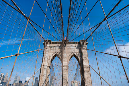Brooklyn bridge in New York. Architecture of historic bridge in Brooklyn. Brooklyn bridge of New York city. New York bridge connecting Manhattan and Brooklyn. New York city architecture.の写真素材