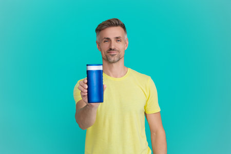 Man with aftershave. Daily habit care. Skincare beauty cosmetic. Shampoo or aftershave. Presenting...