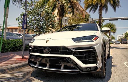 Miami Beach, Florida USA - April 14, 2021: white Lamborghini Urus Sedan, front corner view low angle. sports crossover.のeditorial素材