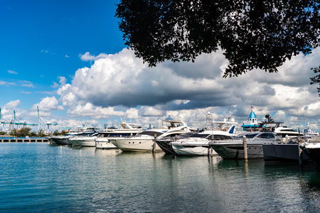 Private luxury boat anchored off Miami beach for summer vacation in  South beach, Florida.