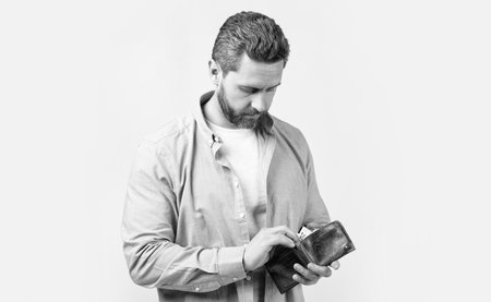 man pay salary banknotes. image of man pay salary. man pay salary isolated on studio background. man pay salary in studio.の写真素材