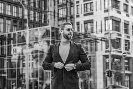 trendy caucasian guy style outdoor. caucasian guy style in the street. caucasian guy style outside. photo of caucasian guy style in jacket.の写真素材