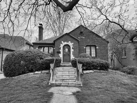 modern cottage house. architecture concept. property in neighborhood. residential building house outdoor. architectural design. residence architecture. suburban house architecture. brick mansion.の写真素材