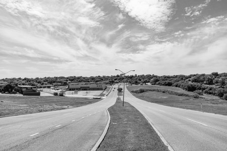 travelling by road way. road way with no cars. empty road with destination in horizon. road way with...