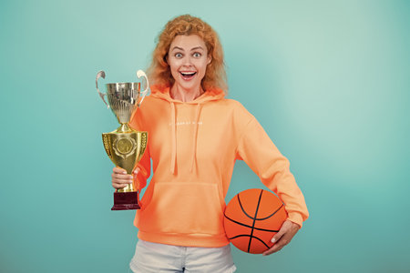 Woman won the prize. Celebrating success. Winning the game. Sport achievement award. Woman with...
