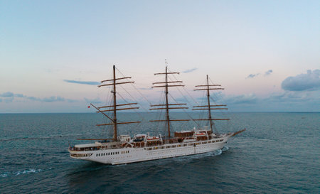 Sailing boat at dramatic sky seascape. Ship sailing the sea. Sail oat at port Miami. Travel by sea....