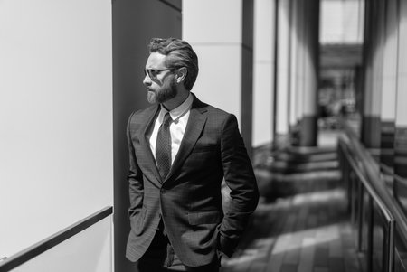 Businessman in suit. Boss business man. Success of entrepreneur. Office manager. Confident businessman executive at business office. New goals. Business vision and leadership. Copy spaceの写真素材