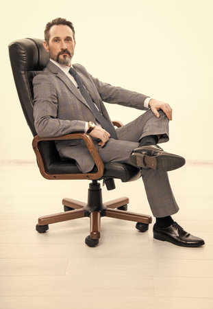 successful businessman man in boss office shows business success and leadershipの写真素材