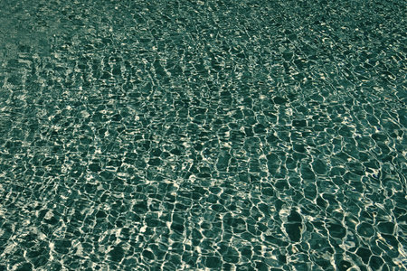 Sea beach background. Summer vacation. Ripple with amazing blue sea lagoon. Sea shore coastline....