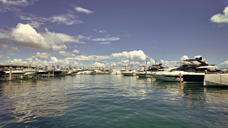 Luxury yacht moored on Lauderdale canal. Luxurious yacht in Miami beach. Marina in Miami Beach. Luxury South beach marina. Miami downtown marina with impressive yacht and boat. Yacht maintenanceの写真素材