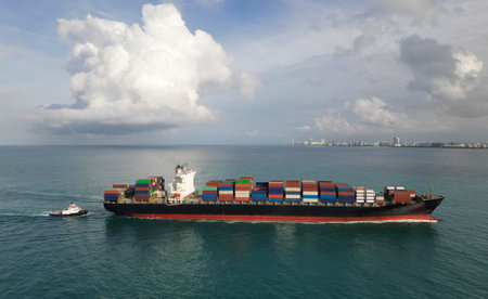 Container ship. Shipping logistics. Commercial shipping. Cargo ship in sea, aerial view. Freight...