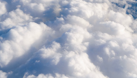 Sky in cloud. Cloudscape with cloudy weather. Cloud and cloudscape aerial sky. Aerial cloudscape view covered with cloud. Aerial cloudy sky view. Cloud view from plane. Cloudy atmosphereの写真素材