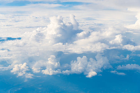 blue sky with a few clouds. The sky is very bright and the clouds are scattered throughout....