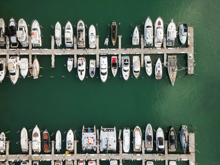 Marina with luxury sea boat. Yacht club and marina in Miami. Luxury marina with private yacht boat. Docked yacht boat in harbor. Luxury summer vacation in Miami. Private boat top view. Marina docksの写真素材