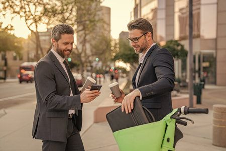 Businessmen working online. Businessmen colleague in suit with phone. Online working. Businessmen...