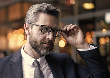 Businessman represent leadership. Business vision and success. Vision of success. Successful leader businessman in suit. Business man look in glasses. Man has vision to successの写真素材