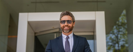 Businessman in suit outdoor. Businessman leaving the office. Mature businessman. Business boss...