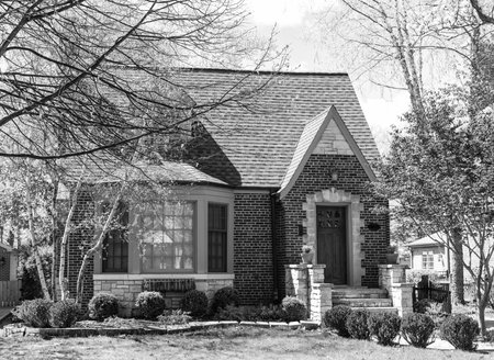 architecture concept. property in neighborhood. real estate and property insurance. property and architecture. housing. suburban house architecture. modern cottage house. suburban streetの写真素材