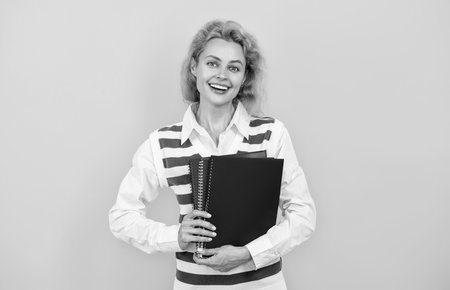 Teacher on yellow. Woman teacher study at university. Teachers from university exam. Woman school...