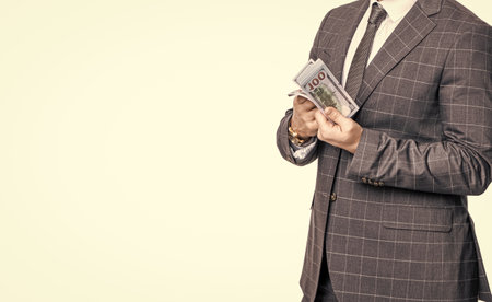 Successful business man investor. Financial investment. Businessman with money isolated on white. Businessman invest money in business. Successful business brings money. Finance businessの写真素材